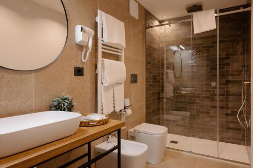 Ванна кімната в Belladonna Hotel