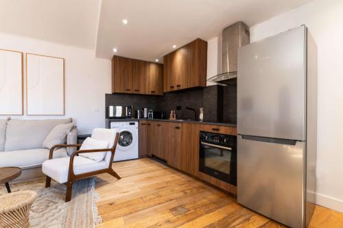 Η κουζίνα ή μικρή κουζίνα στο Appartement place des lices - QUARANTA