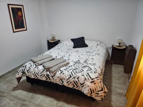 Giường trong phòng chung tại Departamento Patagonia