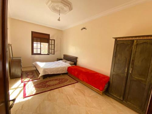 Ένα ή περισσότερα κρεβάτια σε δωμάτιο στο Appartement zone Villa à louer!