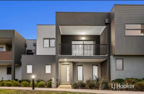 a rendering of a modern apartment building at Cozy room in Cranbourne in Cranbourne West