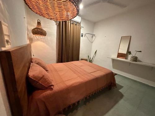 Ένα ή περισσότερα κρεβάτια σε δωμάτιο στο Villa Balche