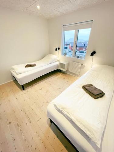 Postel nebo postele na pokoji v ubytování 3 BR home for 6 guests, Hoyvík, Tórshavn