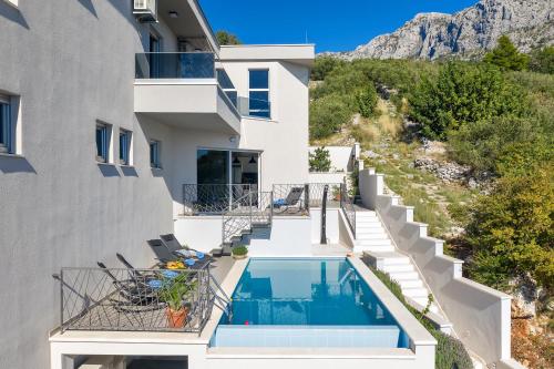 Family friendly apartments with a swimming pool Podgora, Makarska - 11937