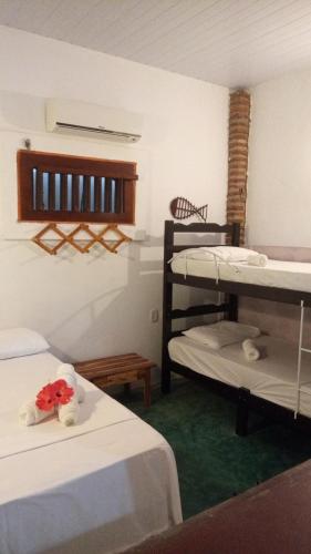 Postel nebo postele na pokoji v ubytování Casa de temporada com piscina Jeri
