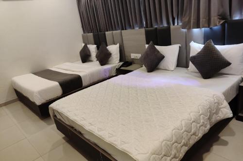 Cama o camas de una habitación en Hotel Selfie Inn
