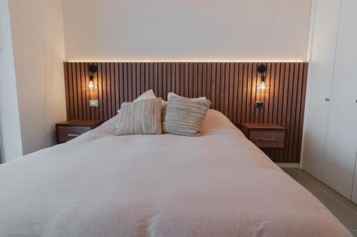 מיטה או מיטות בחדר ב-Departamento Concon con Terraza y vista al mar