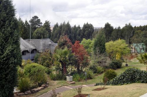 Κήπος έξω από το The Highlander Hotel Dullstroom