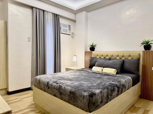 Postel nebo postele na pokoji v ubytování Casa Dee Leticia