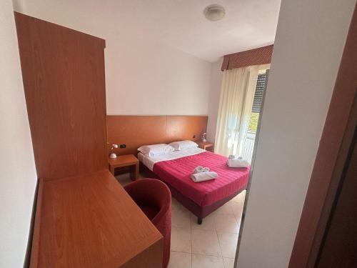 Cama ou camas em um quarto em Il Rampicante-Monticelli Terme
