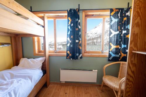 En eller flere senger på et rom på Voss Mountain Lodge