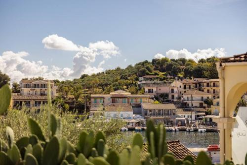 a view of a town with a river and buildings at Villa Edem in Kassiopi