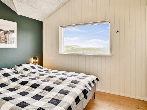 Llit o llits en una habitació de Holiday home Ålbæk VI
