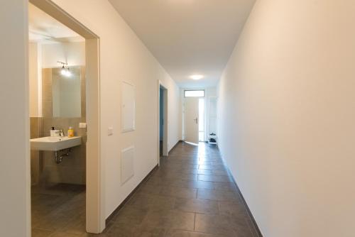 Phòng tắm tại Muzeta Graz - Eco-Friendly Parkview Holiday Apartments in Graz’s Smart City