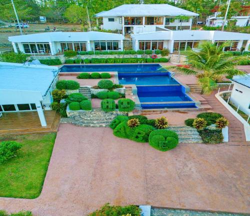 an aerial view of a yard with a swimming pool at The Gabayan Riviera in Siquijor