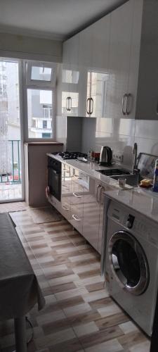 ครัวหรือมุมครัวของ Apartment in Batumi