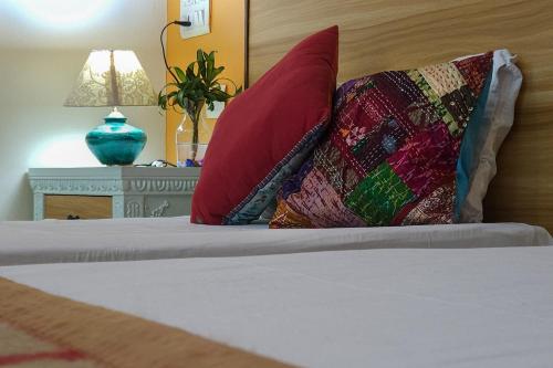 Katil atau katil-katil dalam bilik di Prakash Kutir B&B