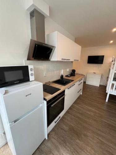 RK Apartmentにあるキッチンまたは簡易キッチン