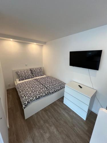 מיטה או מיטות בחדר ב-RK Apartment
