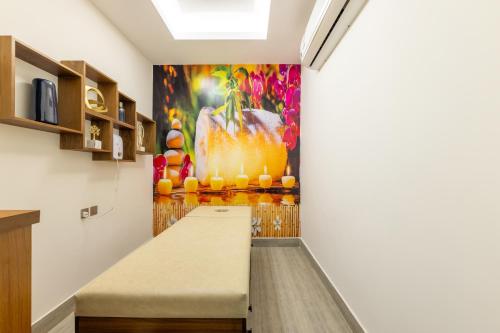 a hallway with a painting on the wall at Luxury Night Al Mounisea in Riyadh