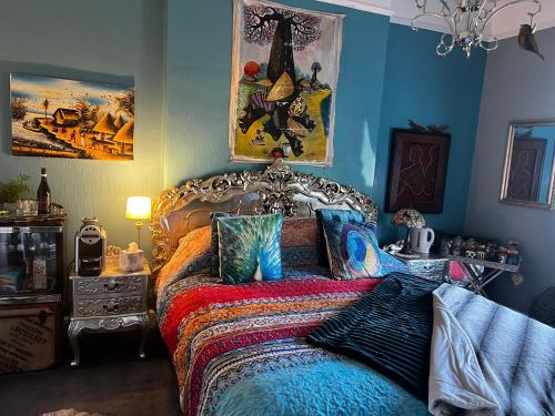 Ein Bett oder Betten in einem Zimmer der Unterkunft Belmont House Boutique - the Kingsley collection