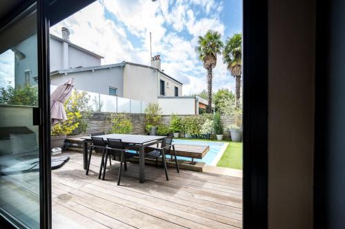 Photo de la galerie de l'établissement Villa avec piscine - 12mn Paris, à Colombes