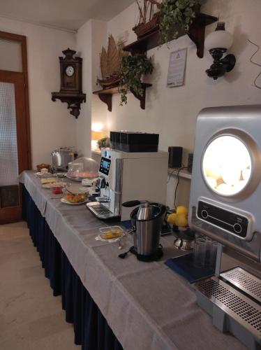 Una cocina o zona de cocina en Hotel Meublè Villa Patrizia
