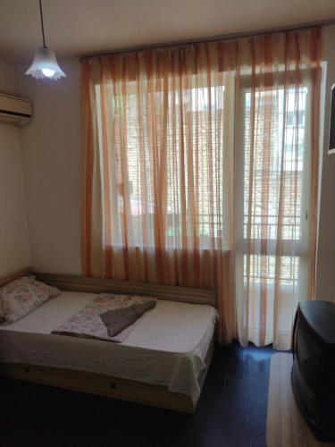 Ένα ή περισσότερα κρεβάτια σε δωμάτιο στο Хаджи Иванов