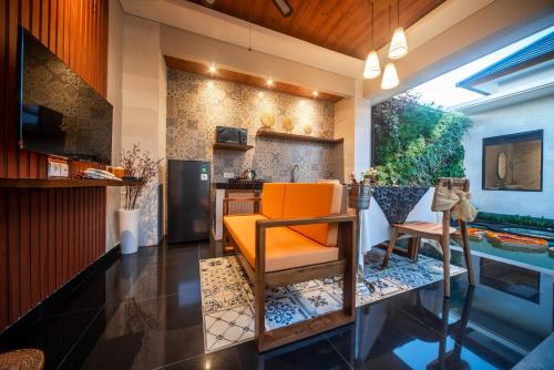 TV a/nebo společenská místnost v ubytování Gaing Mas Jimbaran Villas by Gaing Mas Group