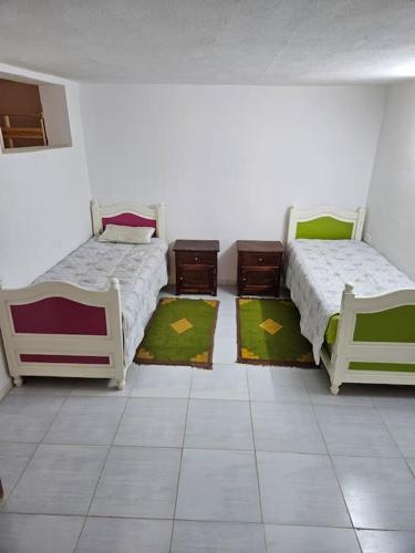 Ένα ή περισσότερα κρεβάτια σε δωμάτιο στο Hadhri Appartement