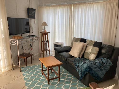 Zona d'estar a 57 On Wellington Accommodation