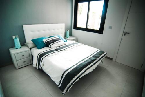 Postel nebo postele na pokoji v ubytování Casa Entremares