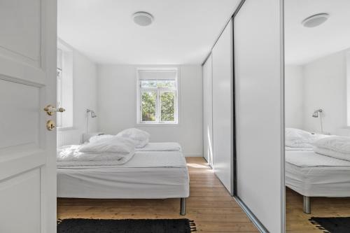 Afbeelding uit fotogalerij van Feriehus med havudsigt in Hasle