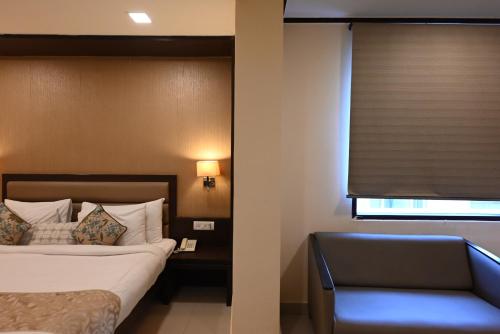 Katil atau katil-katil dalam bilik di Little Chef Hotel