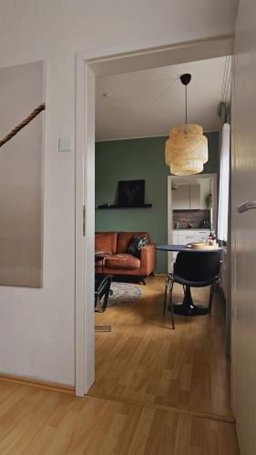 a living room with a couch and a table at Ferienwohnungen Bentheimer Altstadt in Bad Bentheim