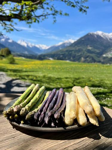 a plate of vegetables sitting on a table at Hotel Restaurant Grünwalderhof in Innsbruck