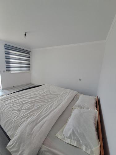 Cama o camas de una habitación en "AILUN" Guest house