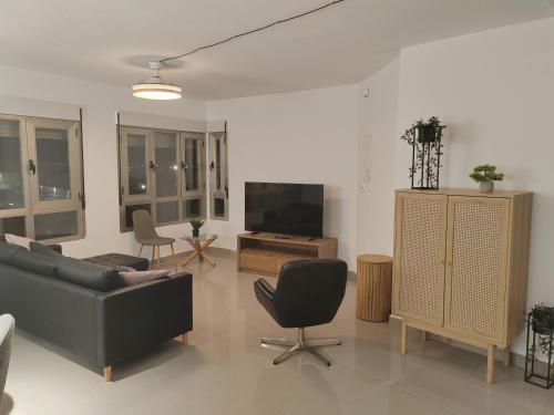 TV a/nebo společenská místnost v ubytování Increible Loft en el Corazon de Lorca