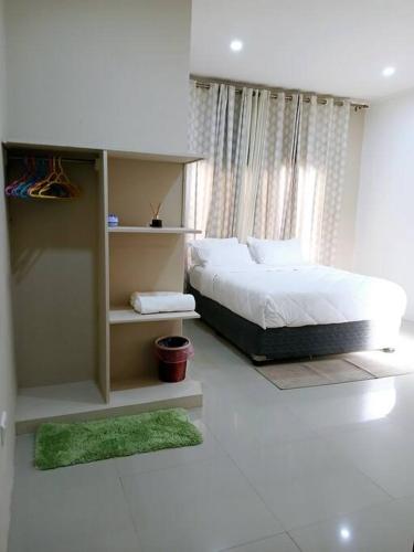 Postel nebo postele na pokoji v ubytování Tulsas Apartments