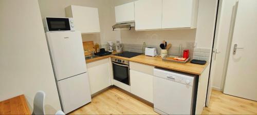 Appartements à thèmeにあるキッチンまたは簡易キッチン