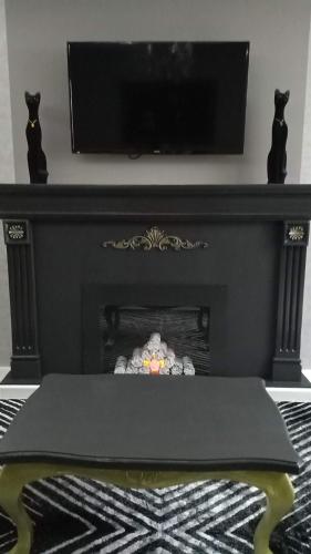 טלויזיה ו/או מרכז בידור ב-Элитная 2-комнатная квартира в районе Болашак