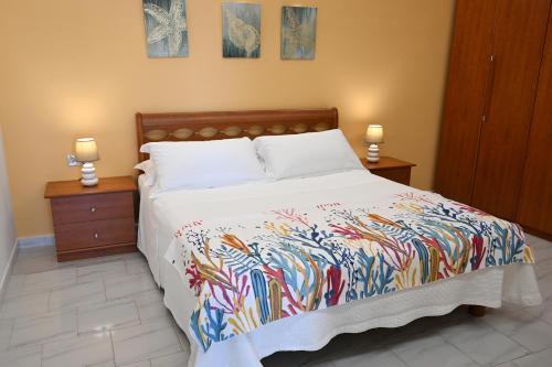 Ένα ή περισσότερα κρεβάτια σε δωμάτιο στο Ravello Art Apartments