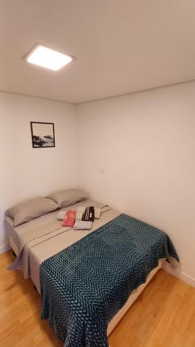 Katil atau katil-katil dalam bilik di Minicasa Show, 27m², com churrasqueira e varanda!
