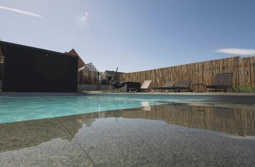 Πισίνα στο ή κοντά στο Vakantiewoning Het Kwartelnest Mettekoven (Heers)
