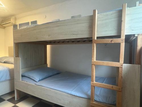 Postel nebo postele na pokoji v ubytování Zupan apartments