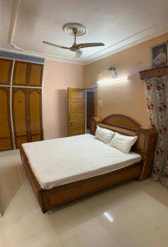 Krevet ili kreveti u jedinici u objektu Mahadev Home Stay