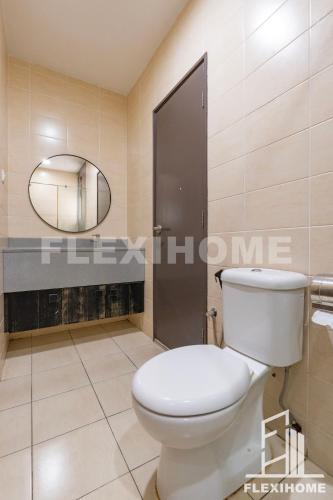 a bathroom with a toilet and a mirror at 10am-6pm, SAME DAY CHECK IN AND CHECK OUT, Work From Home, Shaftsbury-Cyberjaya, Comfy Home by Flexihome-MY in Cyberjaya