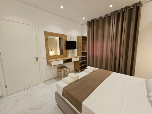 Katil atau katil-katil dalam bilik di Apartments Veliaj