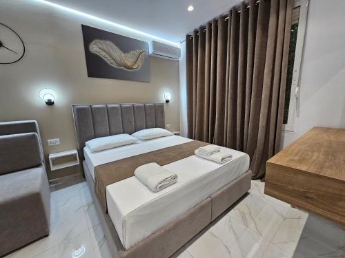 Katil atau katil-katil dalam bilik di Apartments Veliaj