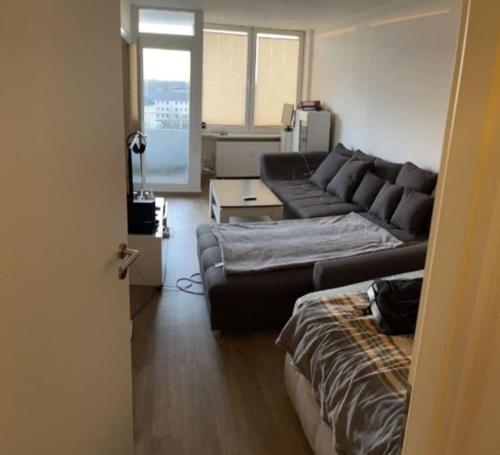 מיטה או מיטות בחדר ב-Private apartment with a beautiful view in Celle